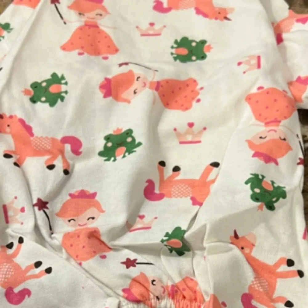 Weenie Warmers Princess Unicorn PJs feature happy little unicorns white & Pink